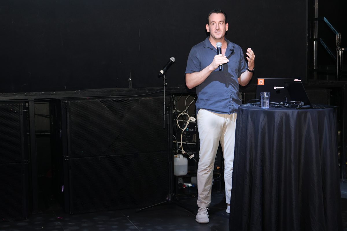 Speaker presenting to the audience
