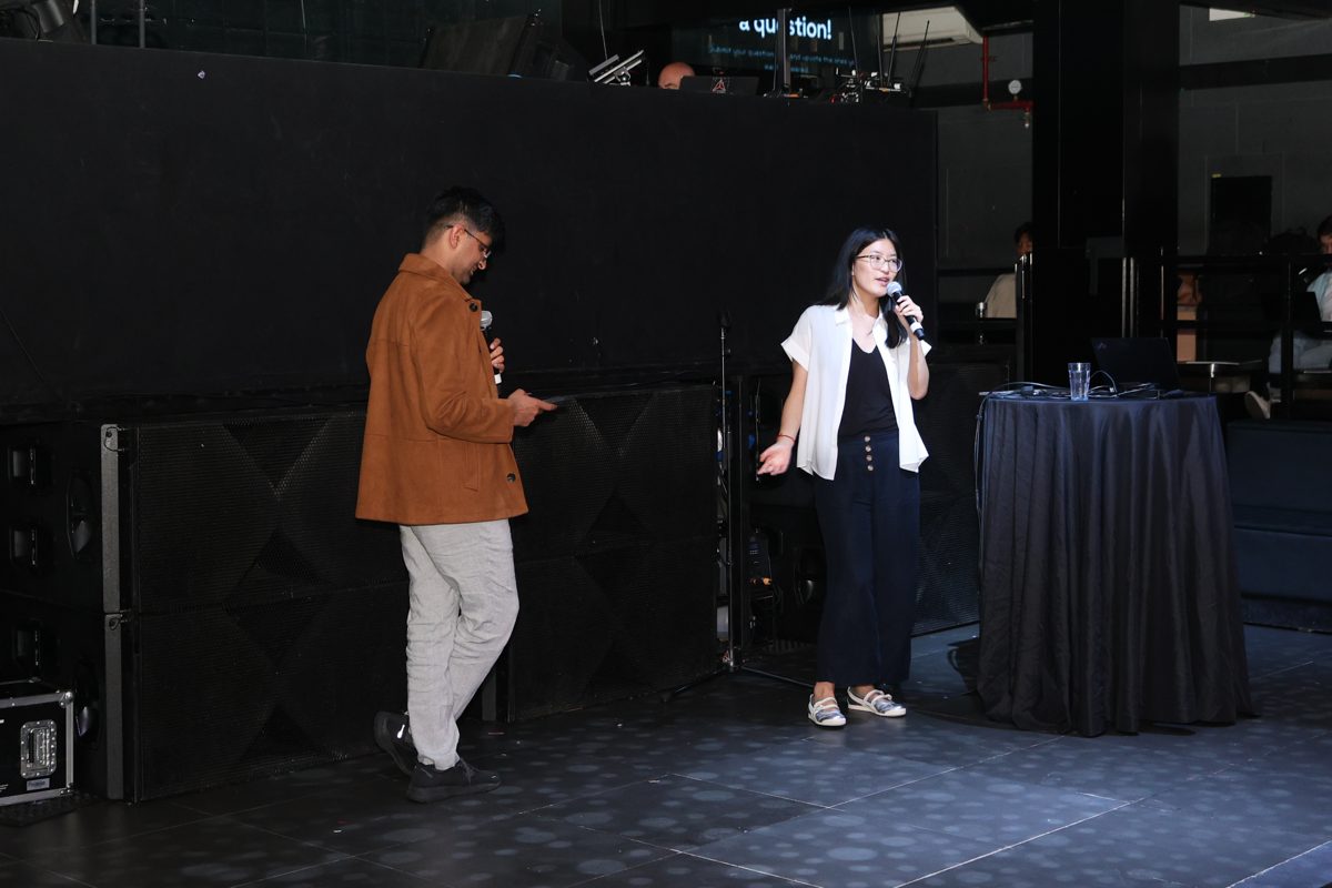 Two speakers on stage