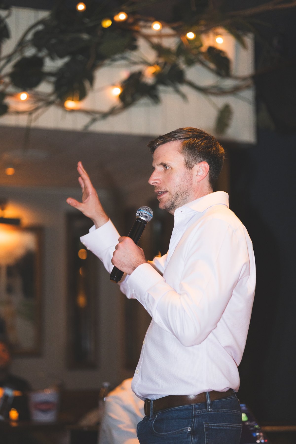 Speaker in white shirt presenting