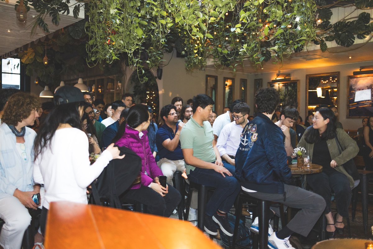 Attendees chatting during break