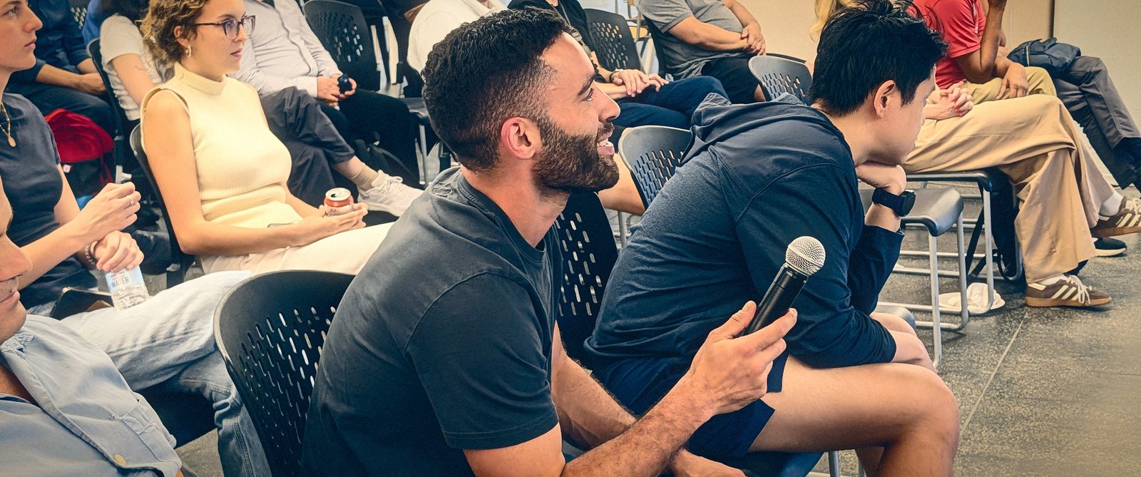 Audience member takes the mic during Q&A